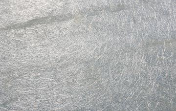 Flushing laminate fibreglass or shingles?