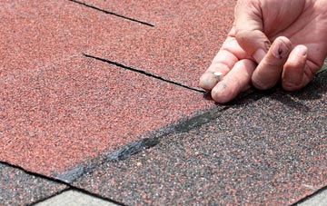 Flushing asphalt roof repairs